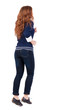back view of jumping  woman  in  jeans.