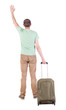 back view of  man  with suitcase.