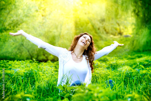 Photo: Beautiful Young Woman Outdoors. Enjoy Nature Beautiful Young Woman Outdoors. Enjoy Nature