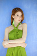 Photo: Portrait of beautiful girl near wall Portrait of beautiful girl near wall