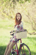 Girl on a bike in the countryside