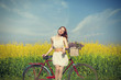 Girl on a bike in the countryside
