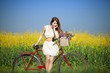 Girl on a bike in the countryside