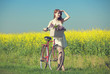 Girl on a bike in the countryside