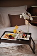 Breakfast in bed at a luxury hotel room