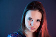Photo: beautiful woman portrait in blue and red light beautiful woman portrait in blue and red light