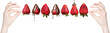 strawberries and chocolate with hand