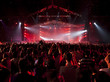 Silhouettes of people and musicians on concert and rays of light