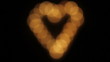 Video: Enfocando un corazón hecho con velas Enfocando un corazón hecho con velas