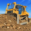 Foto: The bulldozer on a building site The bulldozer on a building site