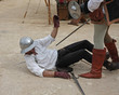 ancient medieval costume with soldier mortally wounded while sim