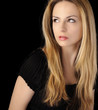 Beautiful young woman with long blond hair
