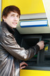 student withdrawing money