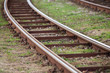 Photo: Turning tramway in the city with grass Turning tramway in the city with grass
