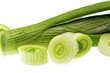 Cutting young onion on white background. Close-Up. Isolated.