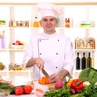 Photo: Chef cooking in kitchen Chef cooking in kitchen
