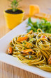Spaghetti with mussels meat and pesto
