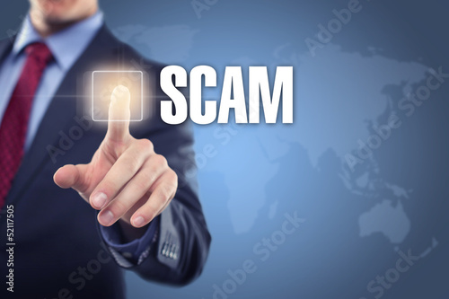 Photo: Man touching display SCAM Man touching display SCAM