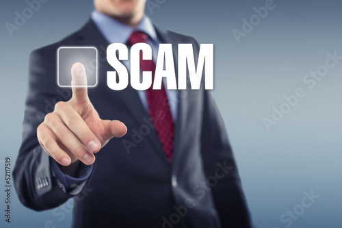 Photo: Man touching display SCAM Man touching display SCAM
