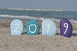 Foto: Happy 2019 on colourful stones Happy 2019 on colourful stones