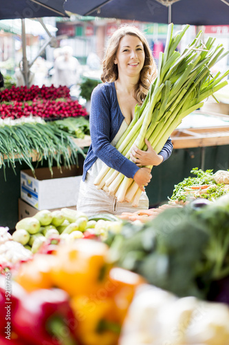 Photo: Young woman at the market Young woman at the market