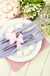 Table setting in violet and pink tones