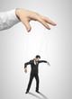 Businessman marionette