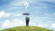 Foto: man standing with umbrella man standing with umbrella