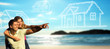 Happy couple on the beach dreaming of a house.
