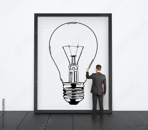 Photo: man drawing lamp man drawing lamp