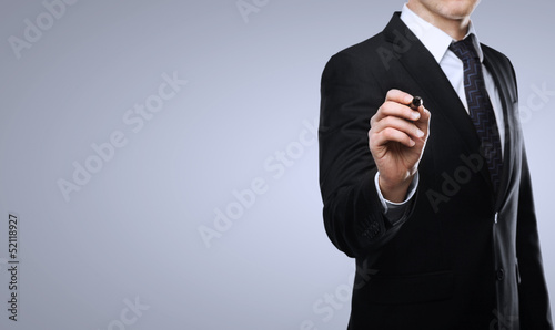 Photo: businessman drawing businessman drawing