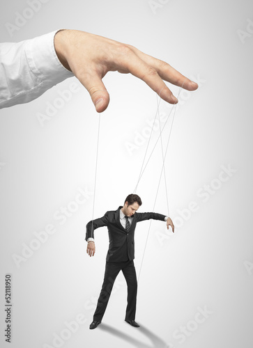 Photo: Businessman marionette Businessman marionette
