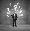 Photo: businessman with four hands and question marks businessman with four hands and question marks