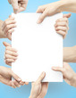 many hands holding poster