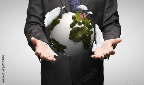 Photo: men holding earth men holding earth