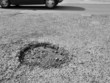 Pothole in road