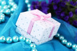 Flowers  and gift  on blue cloth