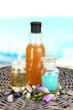 Beautiful spa setting on bamboo napkin on sky background