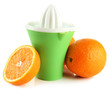 Citrus press and ripe oranges, isolated on white