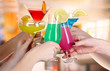 Photo: Cocktails in hands in cafe Cocktails in hands in cafe