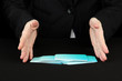 Hand with business cards. Concept: Business like poker game.