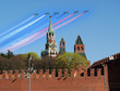 Russian military aircrafts fly in formation over Red Square duri
