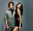Well-Dressed Couple in Elegant Fashion Clothes Hugging