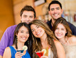 Group of friends having drinks