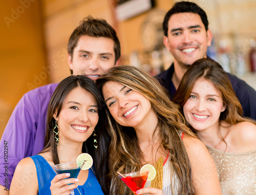Photo: Group of friends having drinks Group of friends having drinks