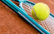 Tennis racket with a ball