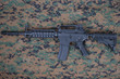 M4 carbine on us marines camouflage uniform