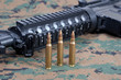 M4A1 carbine with cartridges on us marines camouflage uniform