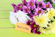 Bouquet of beautiful chrysanthemums on table close-up