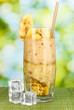 Delicious fruit smoothie on bright background